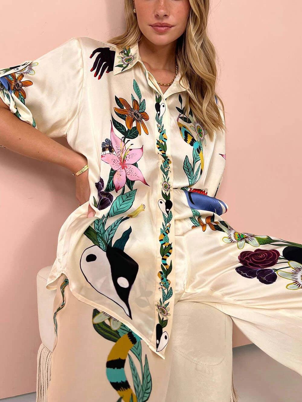 Nika | Set di camicia e pantaloni in satin con stampa unica Vibes Resort